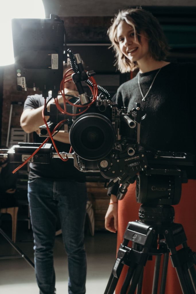 Explore the dynamic atmosphere of a professional studio with this behind-the-scenes shot.